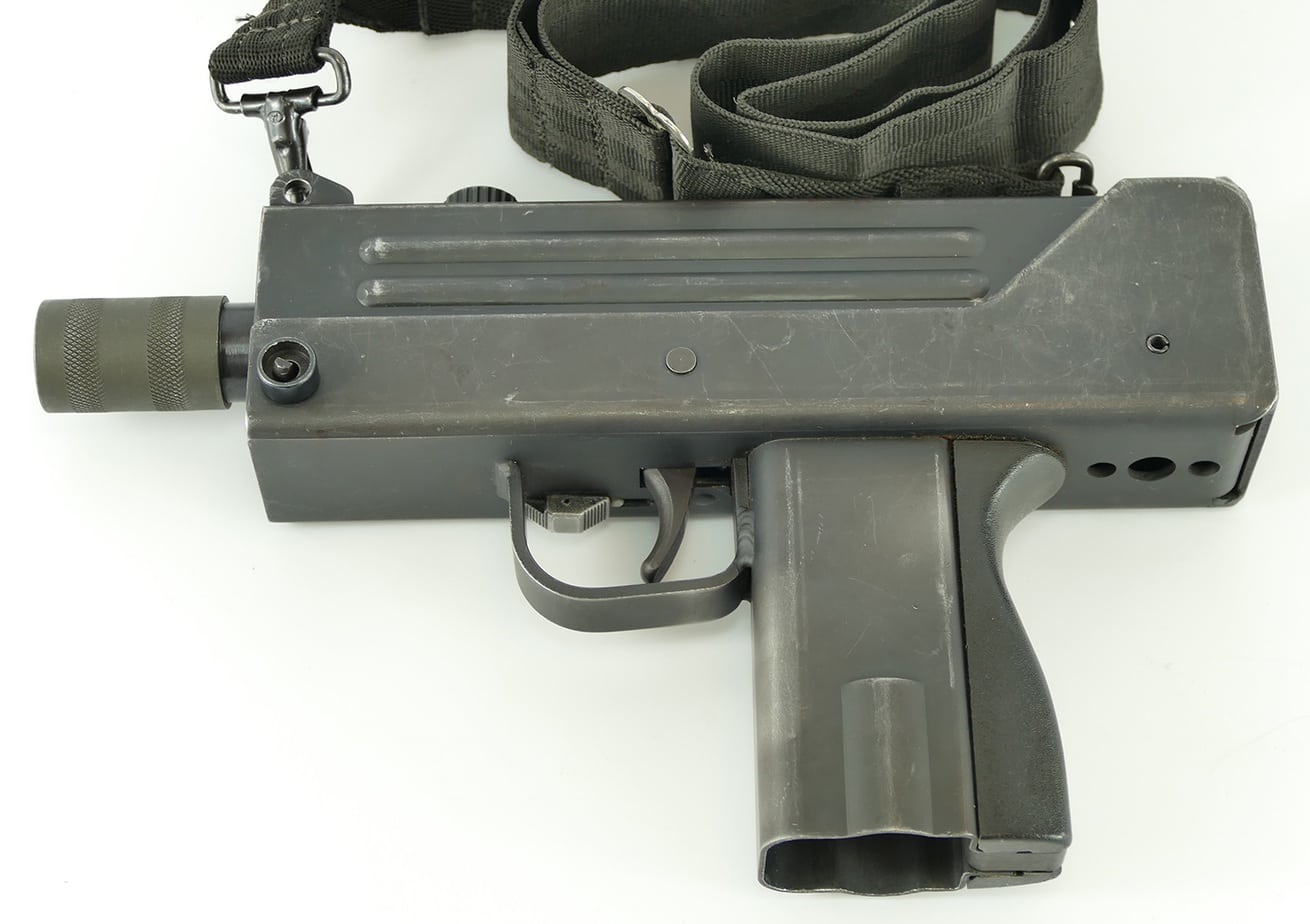 Why the mac 10 in my black benz is a status symbol:  Understand the history and cultural impact of this iconic firearm.